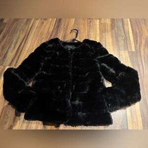 NWOT size small faux fur jacket.
